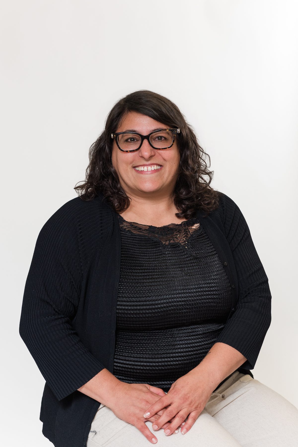 Louise Saad, President and CEO of The Business Doctor, smiling confidently
